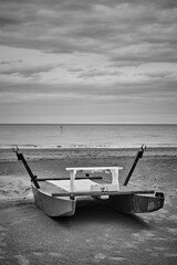 Desolate beach with rescue boat by the sea in Rimini