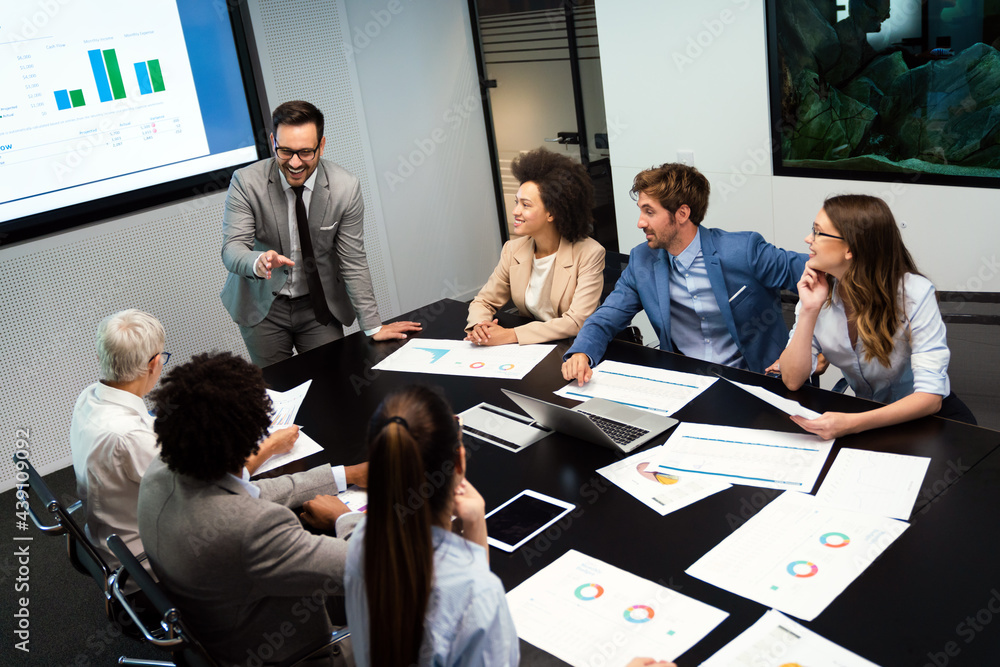 Wall mural group of multiethnic business people working at busy modern office