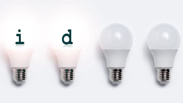 Stop motion animation photography. Close-up of glowing light bulbs with text of 'idea'. Business creative concept.