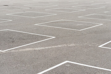 white squares on asphalt 