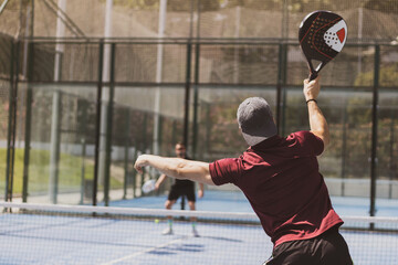 paddle tennis players playing a game