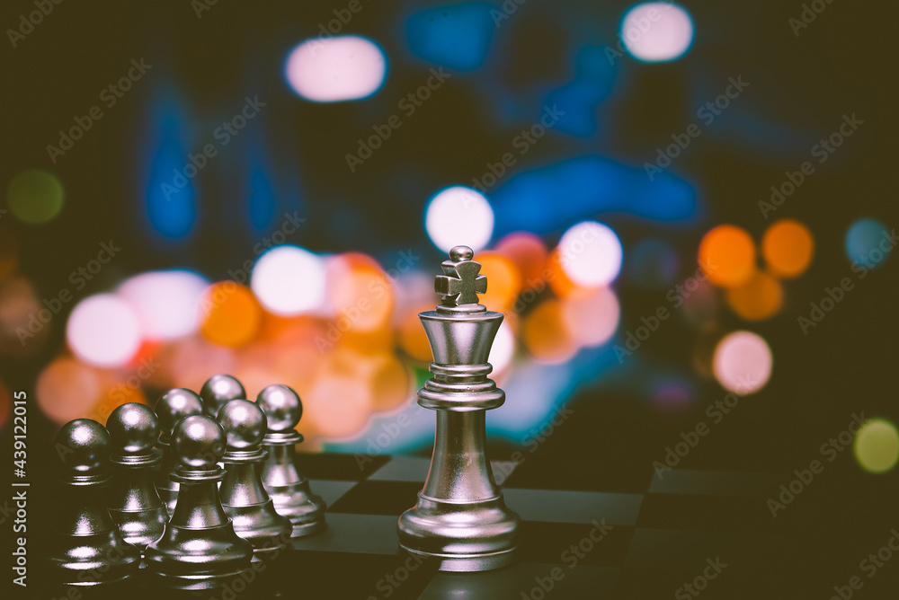Poster closeup of chess characters on board games. to represent decision making in term of business strateg