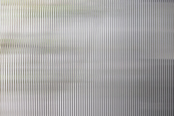 polycarbonate plastic background and texture. Transparent material Corrugated plastic surface use...