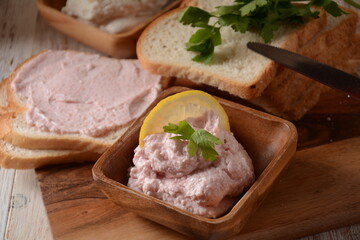 Taramosalata Greek spread Paste (pate) made of ground fish, shrimps, and caviar, served with lemon. Fish Egg Paste Tarama (white and rose), popular Israeli snack.
