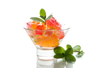 colored sweet fruit jelly in a glass glass