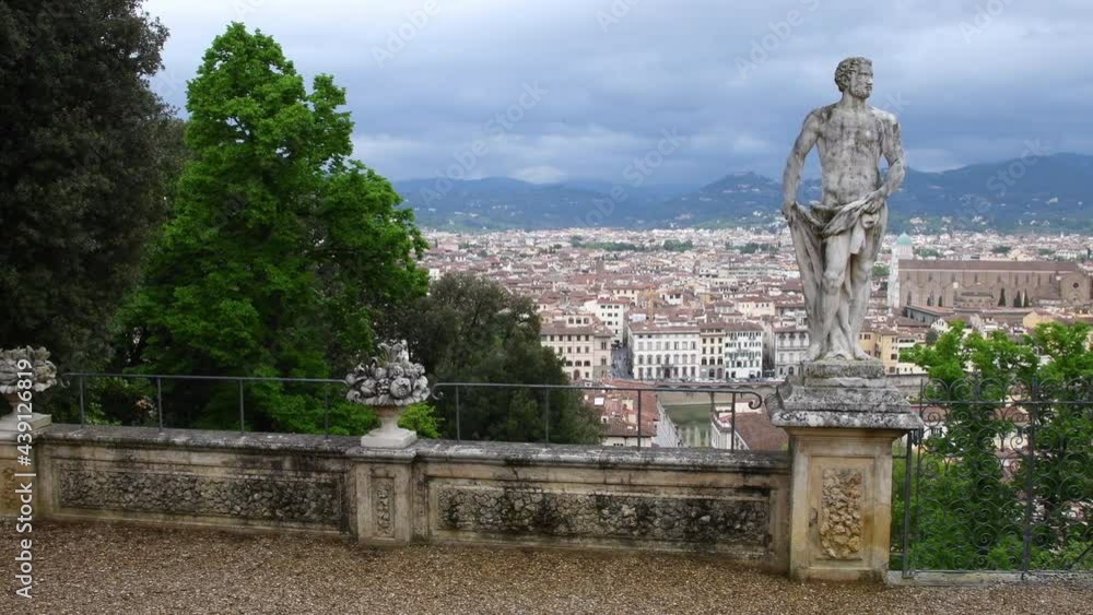 Wall mural cityscape of florence and statues in bardini gardens in florence with the basilica of the holy cross