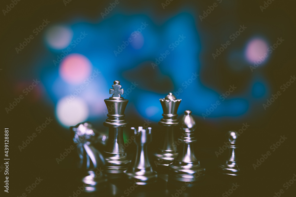 Poster closeup of chess characters on board games. to represent decision making in term of business strateg