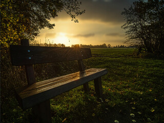 bench in the park on sundown