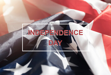 Independence day inscription over USA flag. 4 july card with words over american flag.