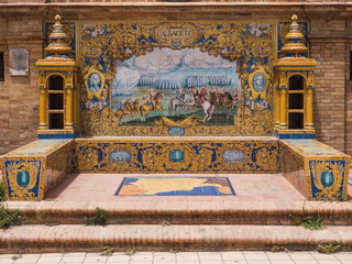 bench in the plaza españa in seville, representing historical events in Albacete in Pisan tiles...