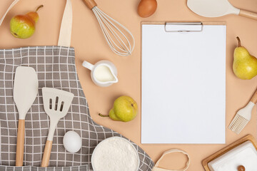 Clipboard with white paper, baking ingredients and cooking utensil, mockup. Template for cooking recipes or your design. Top view Flat lay
