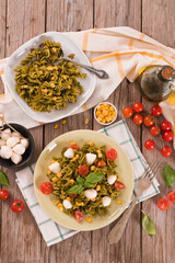 Fusilli pasta with cherry tomatoes and sweet corn.