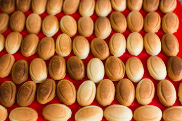 Homemade Russian traditional cookies or cakes in the shape of nuts filled with boiled condensed milk