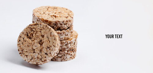 Stack of Whole grain crispbreads on white background. Copy space