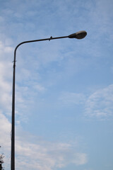 street lamp on blue sky