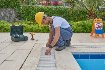 Pool grid and grill repair style with repairman.