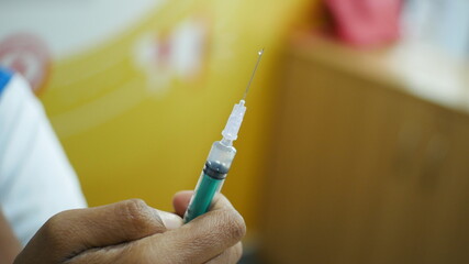 Vaccine syringe