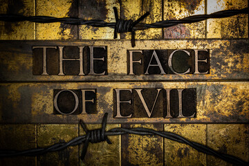 The Face of Evil text on vintage textured grunge copper and gold bar background with barbed wire