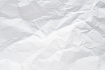 White crumpled paper texture background.