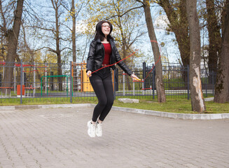 young girl jumping rope