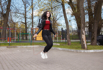 young girl jumping rope