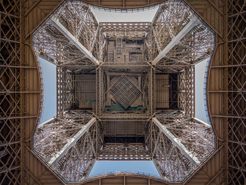 Eiffel Tower architecture detail, Simetric metal structure from below.