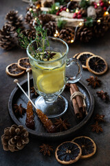 Christmas composition with hot spiced wine with citrus