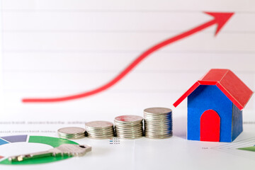 The house and growing coin and the key put on the investment proportion chart on the red up arrow...