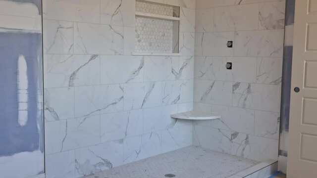 Designer renovation construction bathroom with interior of master bathroom patching drywall