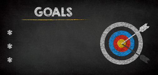 Goals and Target with arrow on chalkboard background