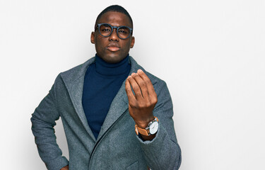 Young african american man wearing business clothes and glasses doing italian gesture with hand and fingers confident expression