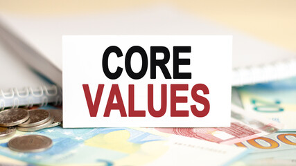 core values words inscription on white card paper, concept. red and black letters