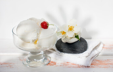 Fototapeta na wymiar Cream ice cream in a cup. Summer cooling dessert