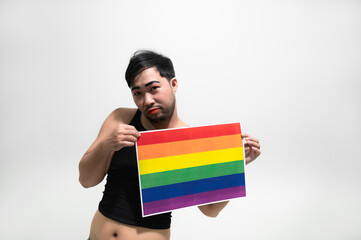LGBT Pride month concept,Asian Handsome male make up and wear woman cloth,Gay Freedom Day,Portrait of Non-binary on white background