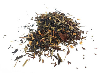 Aerial view of organic ginger and lemon green tea. Ground dried leaves or buds of the Camellia sinensis bush for flavored infusion. Drinks and infusions concept.