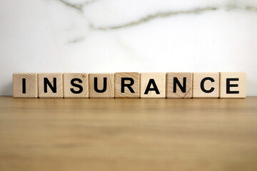 Insurance word from wooden blocks