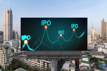 IPO icon hologram on road billboard over day time panorama city view of Bangkok. The hub of initial...