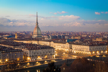 Turin, Italy. Panorama from Monte dei Cappuccini (Cappuccini's Hill) at sunset with Alps mountains...