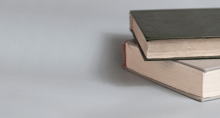 The book  on the table. Reading, literature, learning and back to school concept. Copy space.