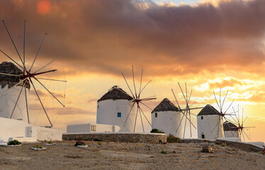 Traditional windmills, Mykonos island landmark at sunset, Cyclades Greece