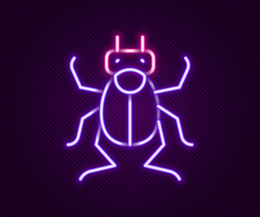 Glowing neon line Beetle bug icon isolated on black background. Colorful outline concept. Vector