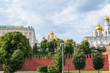 The Kremlin wall. with green trees temples on the Kremlin's High quality photo