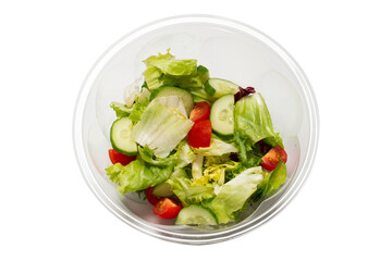 Salad with fresh vegetables isolated on a white background.