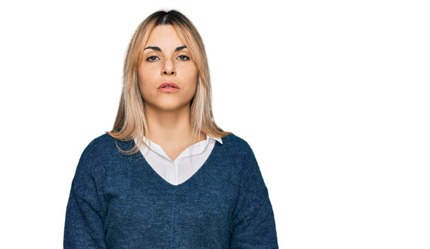 Young caucasian woman wearing casual clothes relaxed with serious expression on face. simple and natural looking at the camera.