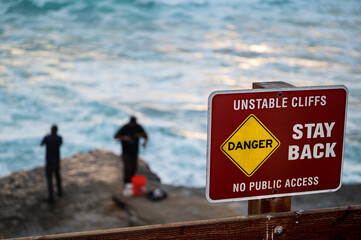 Danger Sign Stay Back Unstable Cliffs at La Jolla Cove, California, Located in San Diego County.