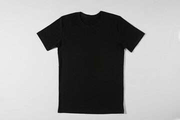 Black beautiful T-shirt on a light background