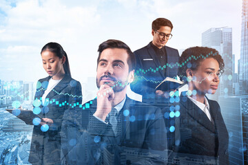 Group of business colleagues working on new venture capital and hi-tech start up and try to...