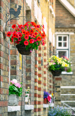 Closeup detial of English houses with hanging baskets