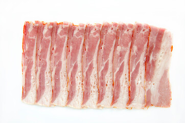 sliced smoked bacon close up on white background