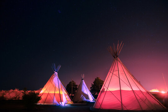 Teepee's glowing at night in Marfa, Texas